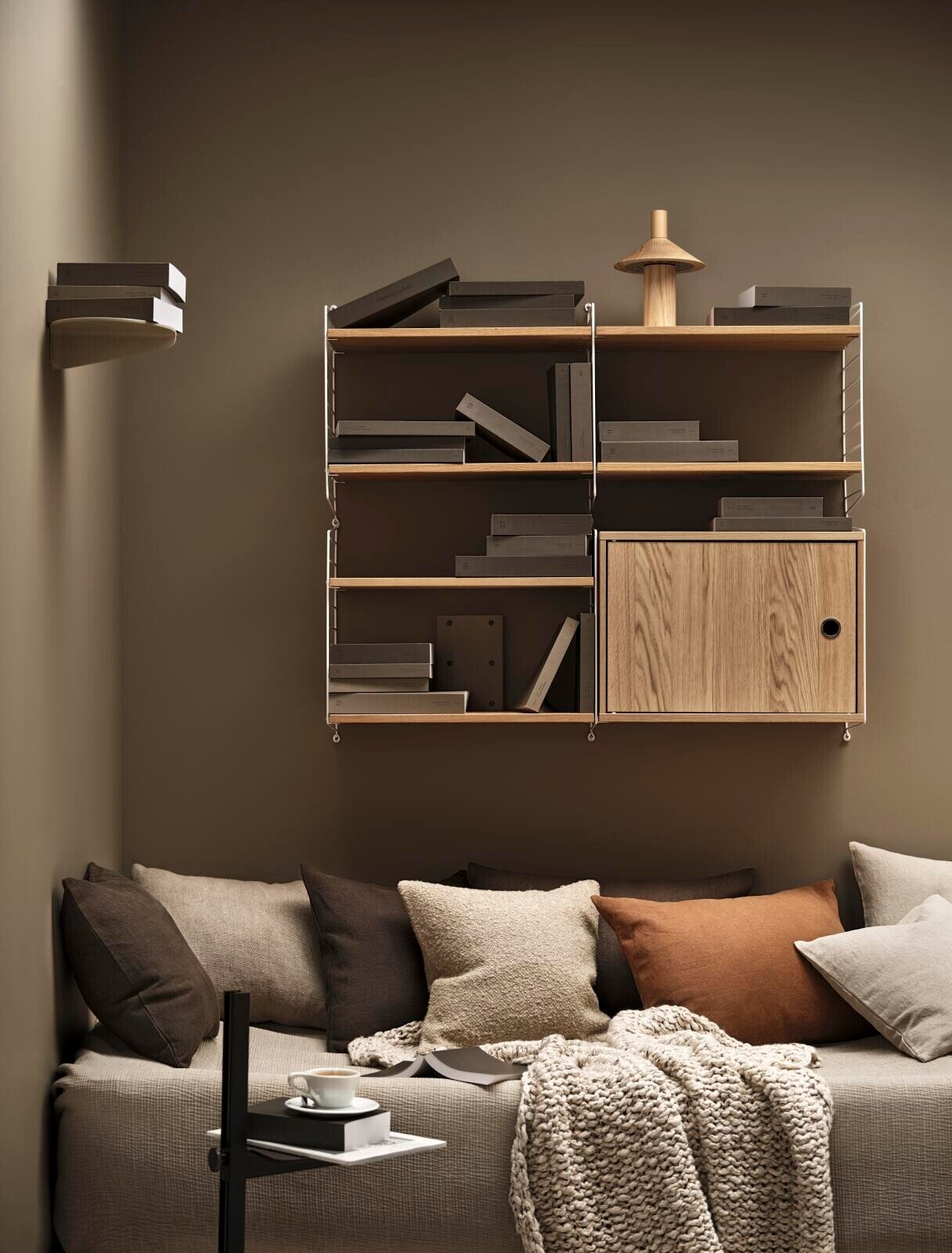 A wall-mounted living room shelf with a Display cabinet with swing glass door. This shelf combination has lots of room for books, magazines, and fragile items.