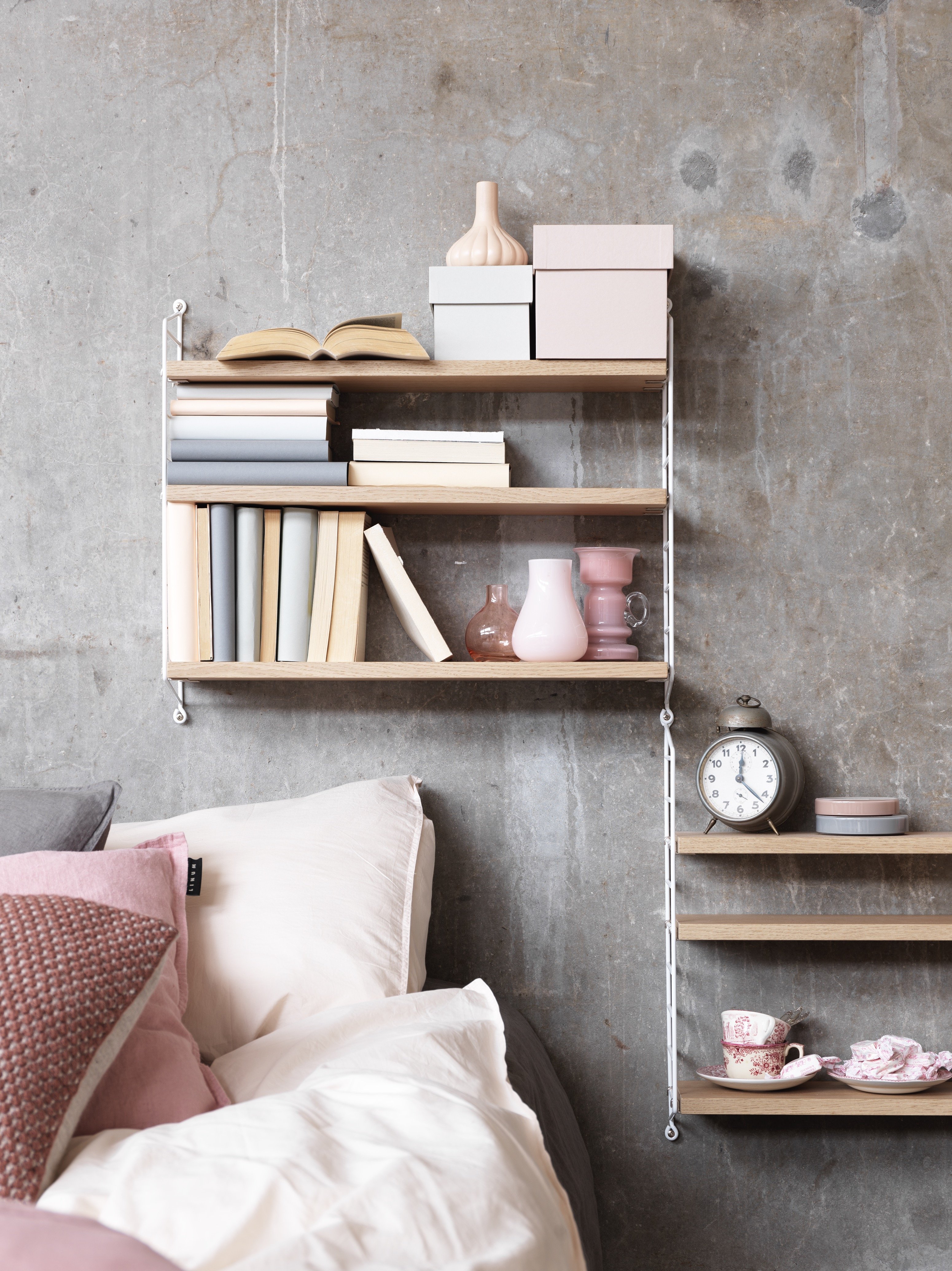 String® Pocket is sold as a complete shelf but is equally flexible as String® System. String® Pocket invites creativity and personality where you can combine two or three String® Pocket shelves into one larger shelf. Mix and match different colours and wooden alternatives to suit your style and preferences. Since the shelf is neat and practical it fits equally well as a nightstand as an extra shelf in your hallway. String® Pocket is sold as one complete unit containing two wire panels, height 50 cm, and three shelves, width 58 cm and depth 15 cm.