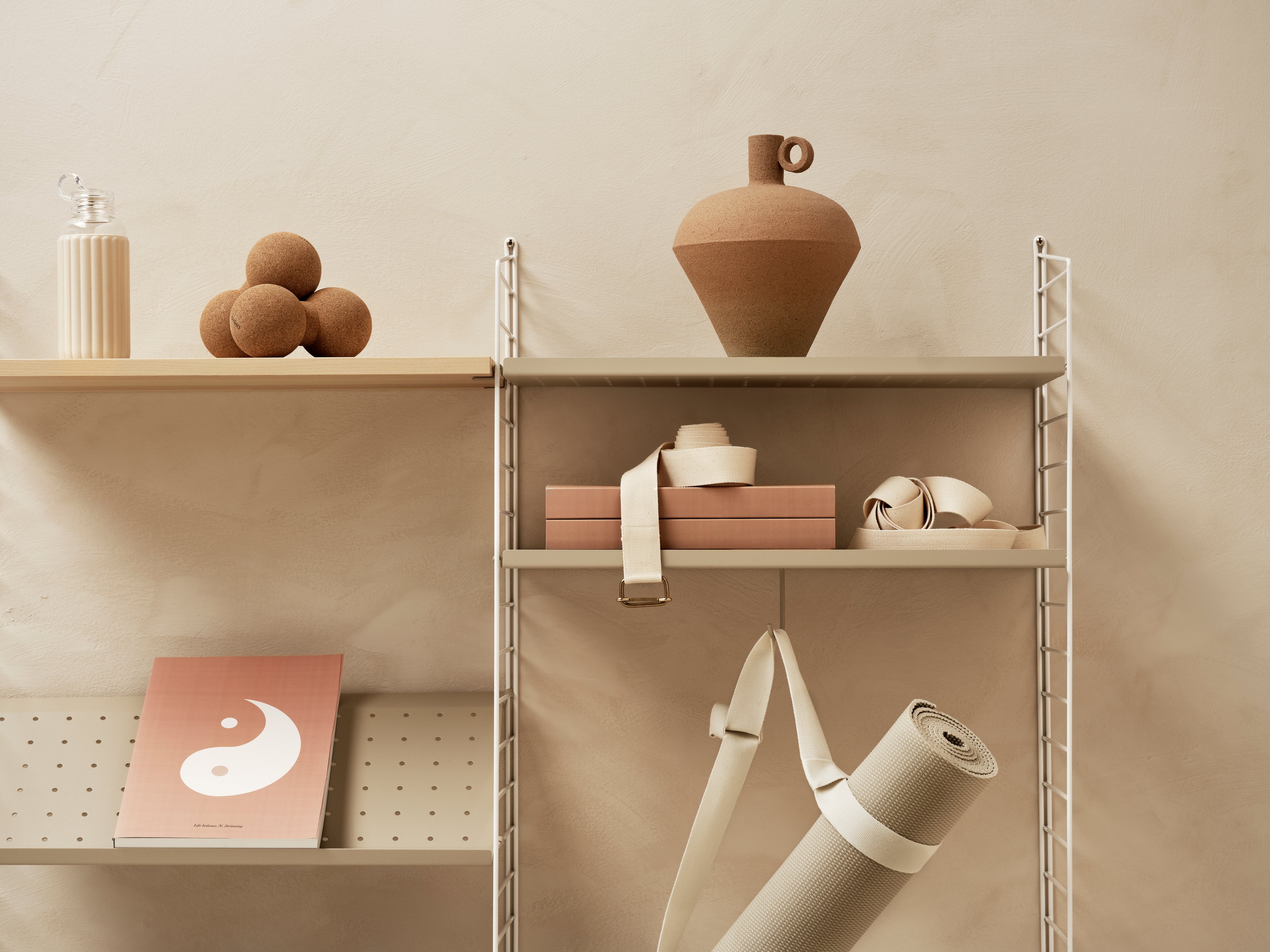 The metal shelves with low edge are available in two widths, 58 and 78 cm, along with two depths, 20 and 30 cm. The shelves are easy to move around and fit into wire and plex panels from String® System if the shelves and panels have the same depth. The 2 cm high edge makes the shelves blend right into a shelving combination with wooden shelves. The perforated shelves are the optimal base to be creative with our accessories. Add hooks, rods, or hanger racks to design your own unique shelf. Each packaging contains one metal shelf.