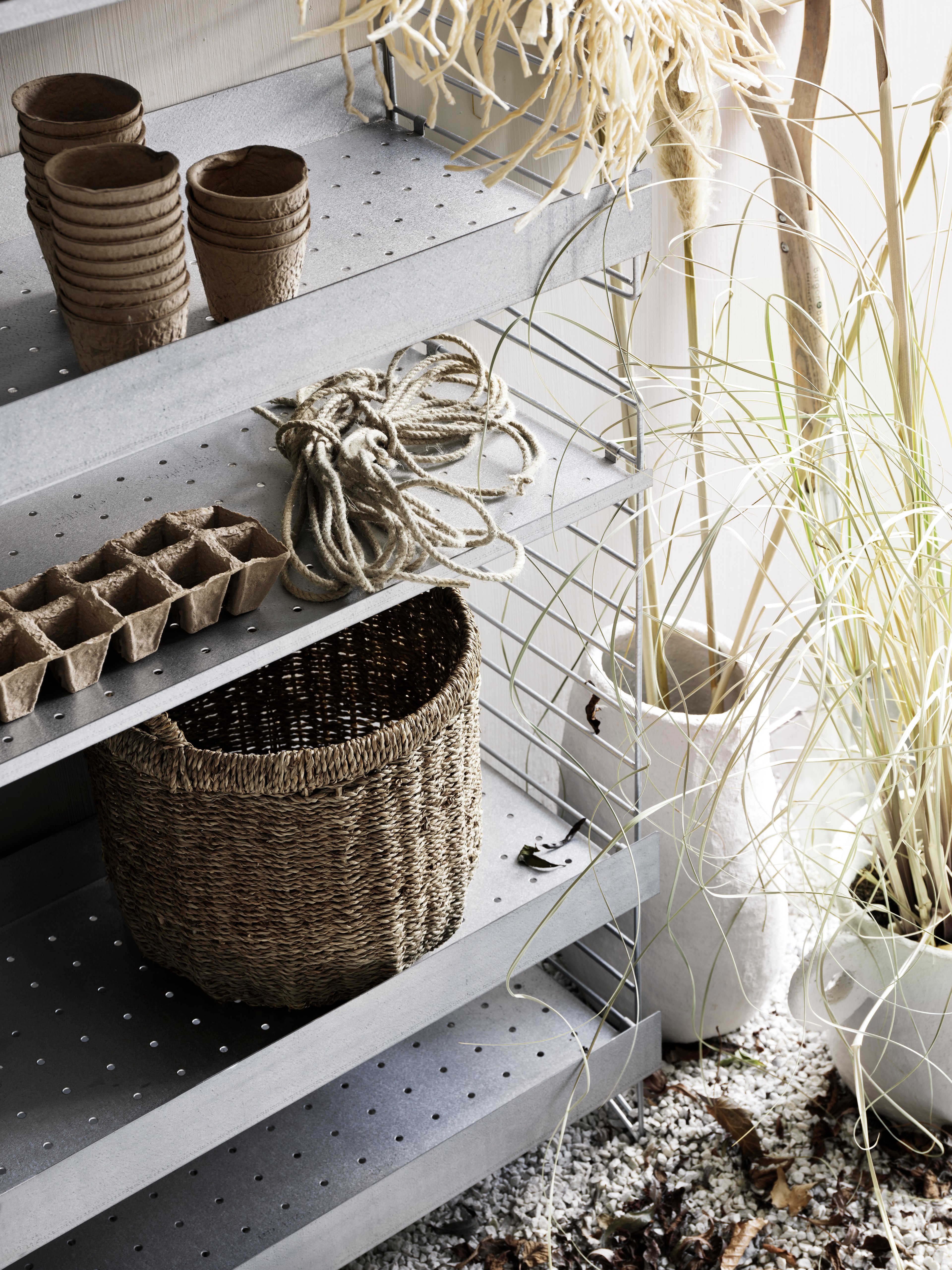 This floor mounted one-section combination is intended for outdoor use. With galvanized panels and shelves, the surface changes with time and leaves you with a beautiful patina. A combination of shelves with high and low edge gives the unit character.