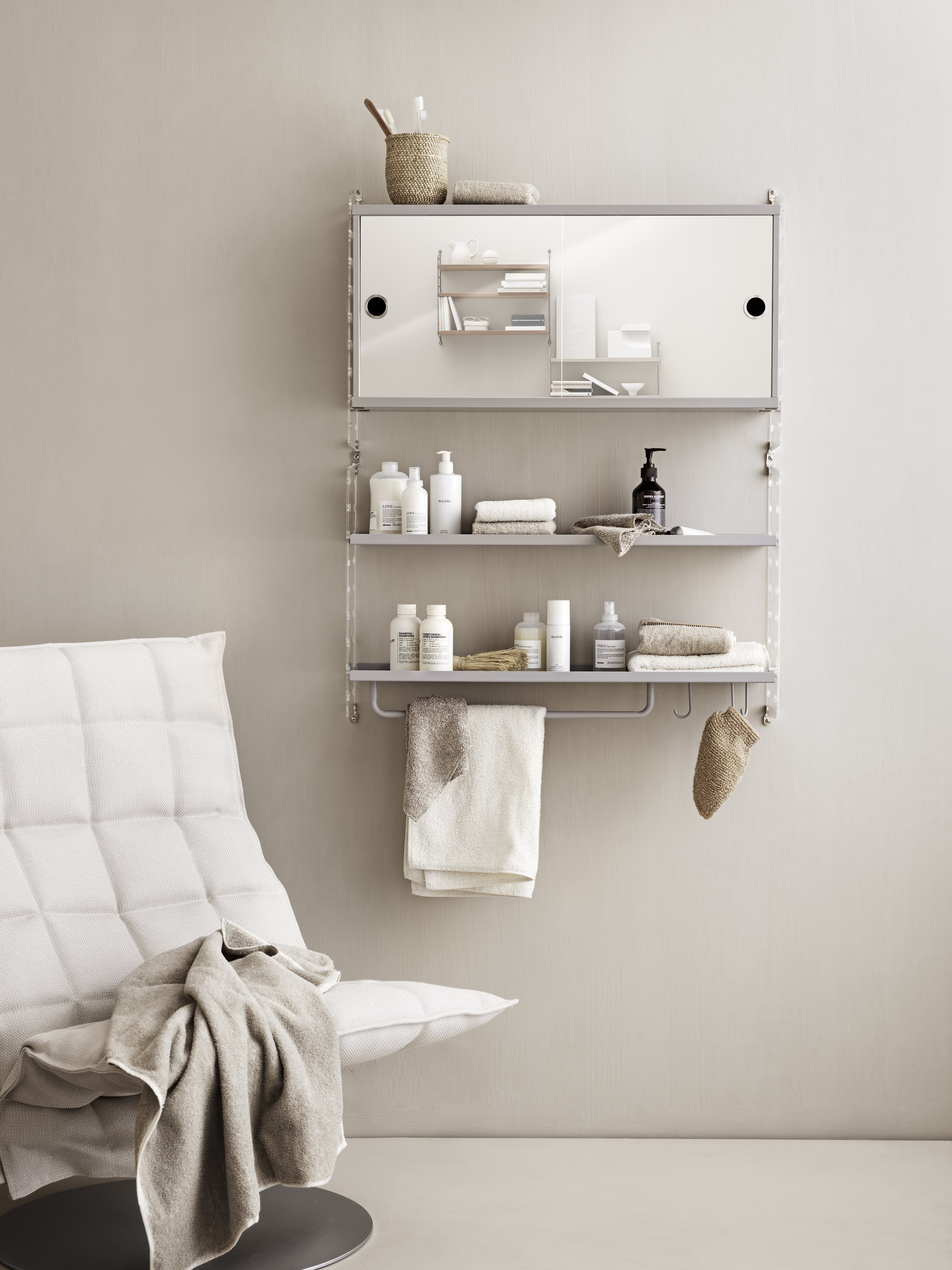 Neat wall-hung combination perfect for the smaller or medium sized bathroom. Cabinets with mirror doors give you all the storage you need for your toiletries and shelves adorned with hooks open up for even more storage.