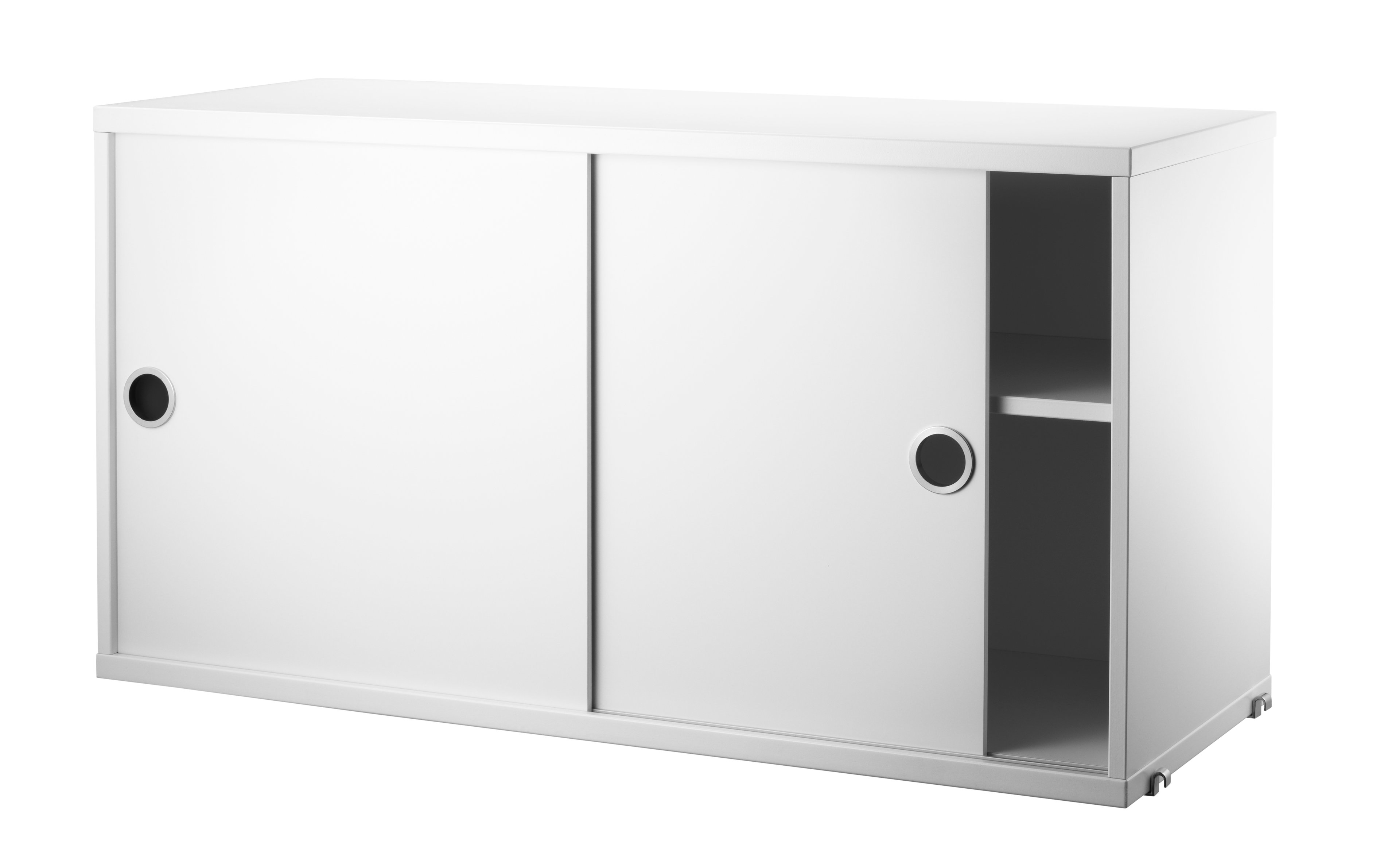 The cabinets with sliding doors are available in one width, 78 cm, along with two depths, 20 and 30 cm. The cabinets fit into all wire and plex panels from String® System. It is visually pleasing to add a bolder element to your shelf, like a cabinet, which also give you a lot of extra storage. The cabinet consists of one divider placed in the middle along with two adjustable inner shelves. The cabinet’s inner dimensions are 4 cm less than the outer dimensions. The cabinets are delivered unassembled.
