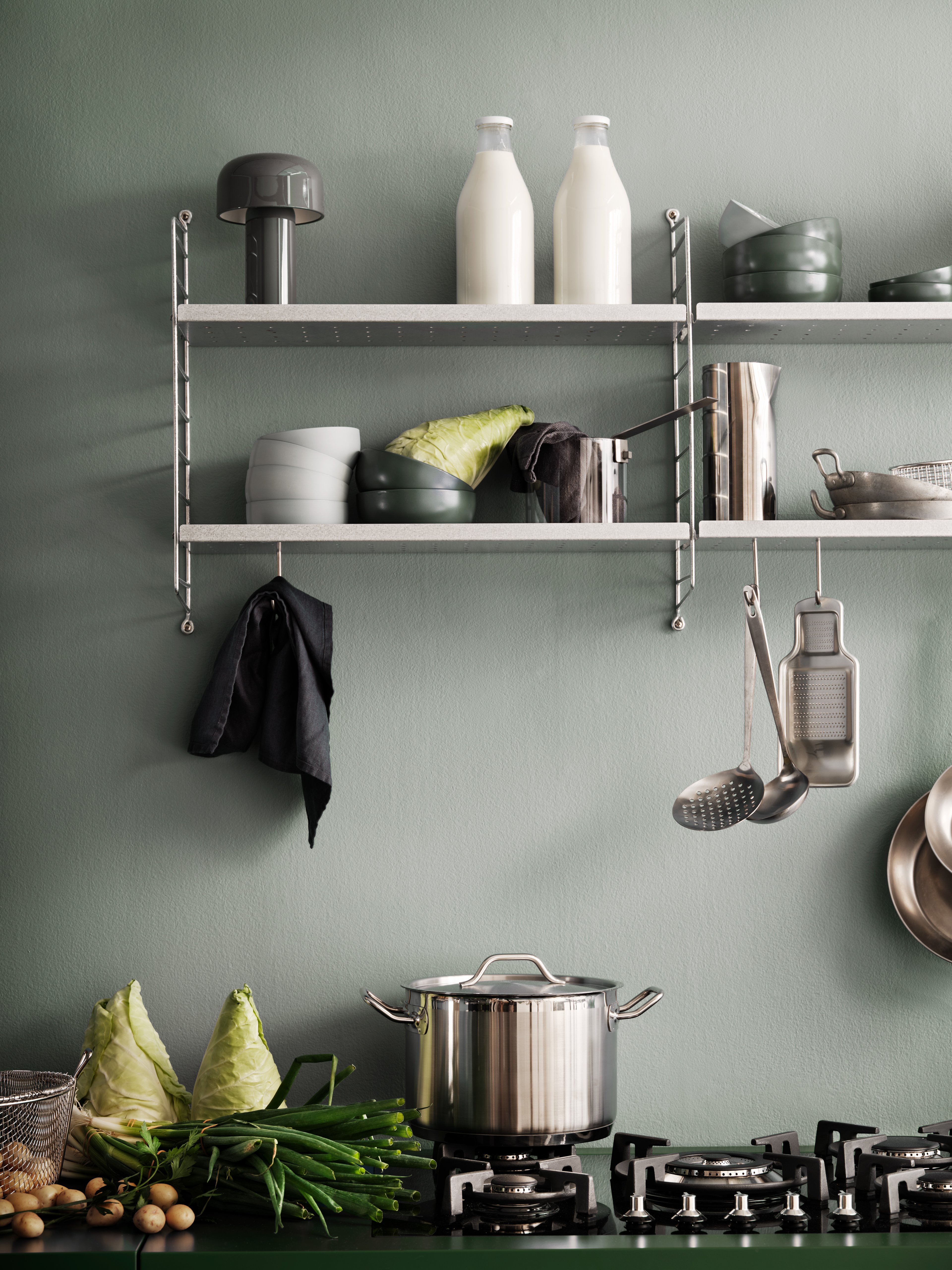 The galvanized wall panels are available in one height, 50 cm along with two depths, 20 and 30 cm. The panels are the base when building your string shelf outdoors. Then, you can start adding galvanized shelves from String® System. Add outdoor-proofed accessories such as j-hooks and s-hooks to cover your storage need. The panels are mounted onto a house façade, wooden fence, or other type of wall where it can stay all year round. The wall panels come in two different packaging’s, either with one wall panel or two wall panels.