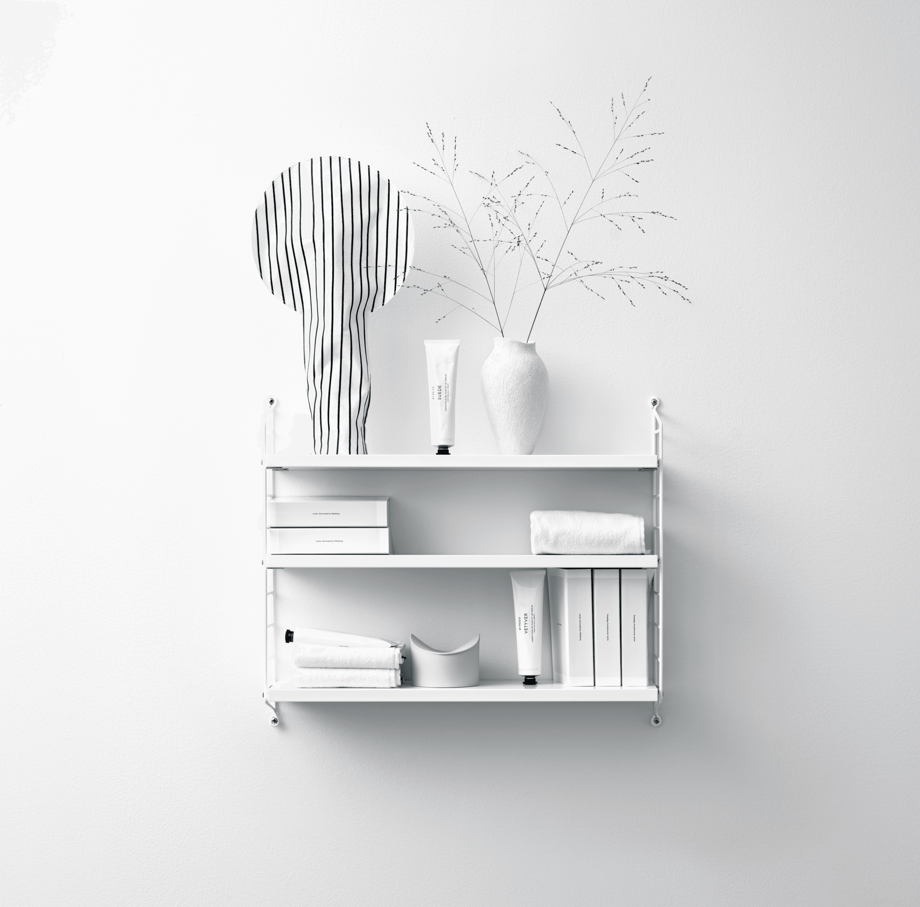 String® Pocket is sold as a complete shelf but is equally flexible as String® System. String® Pocket invites creativity and personality where you can combine two or three String® Pocket shelves into one larger shelf. Mix and match different colours and wooden alternatives to suit your style and preferences. Since the shelf is neat and practical it fits equally well as a nightstand as an extra shelf in your hallway. String® Pocket is sold as one complete unit containing two wire panels, height 50 cm, and three shelves, width 58 cm and depth 15 cm.