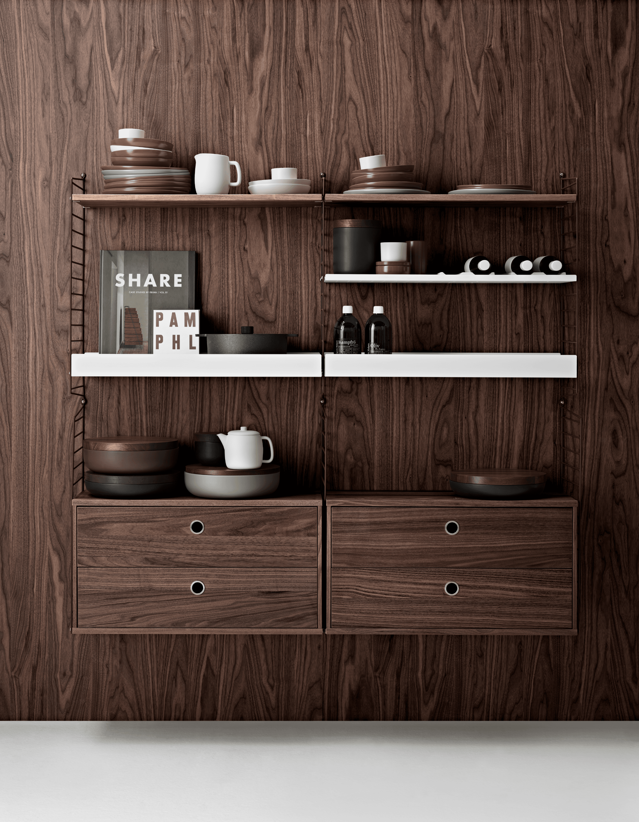 The floor panels are available in three heights, 85 cm, 115 cm, 200 cm along with one depth, 30 cm. The panels are the base when building your string shelf. When the panels are decided you can start adding products with 30 cm depth from String® System. Choose among shelves, cabinets, drawers, magazine shelves and more. The foot of the floor panel rests against the floor which makes the shelf stable while appearing light and airy. Make your shelf even more functional and unique by adding organizers, knife holder or a magazine holder, which all are placed on the panel’s threads. The panels come in two different packaging’s, either with one floor panel or two floor panels.