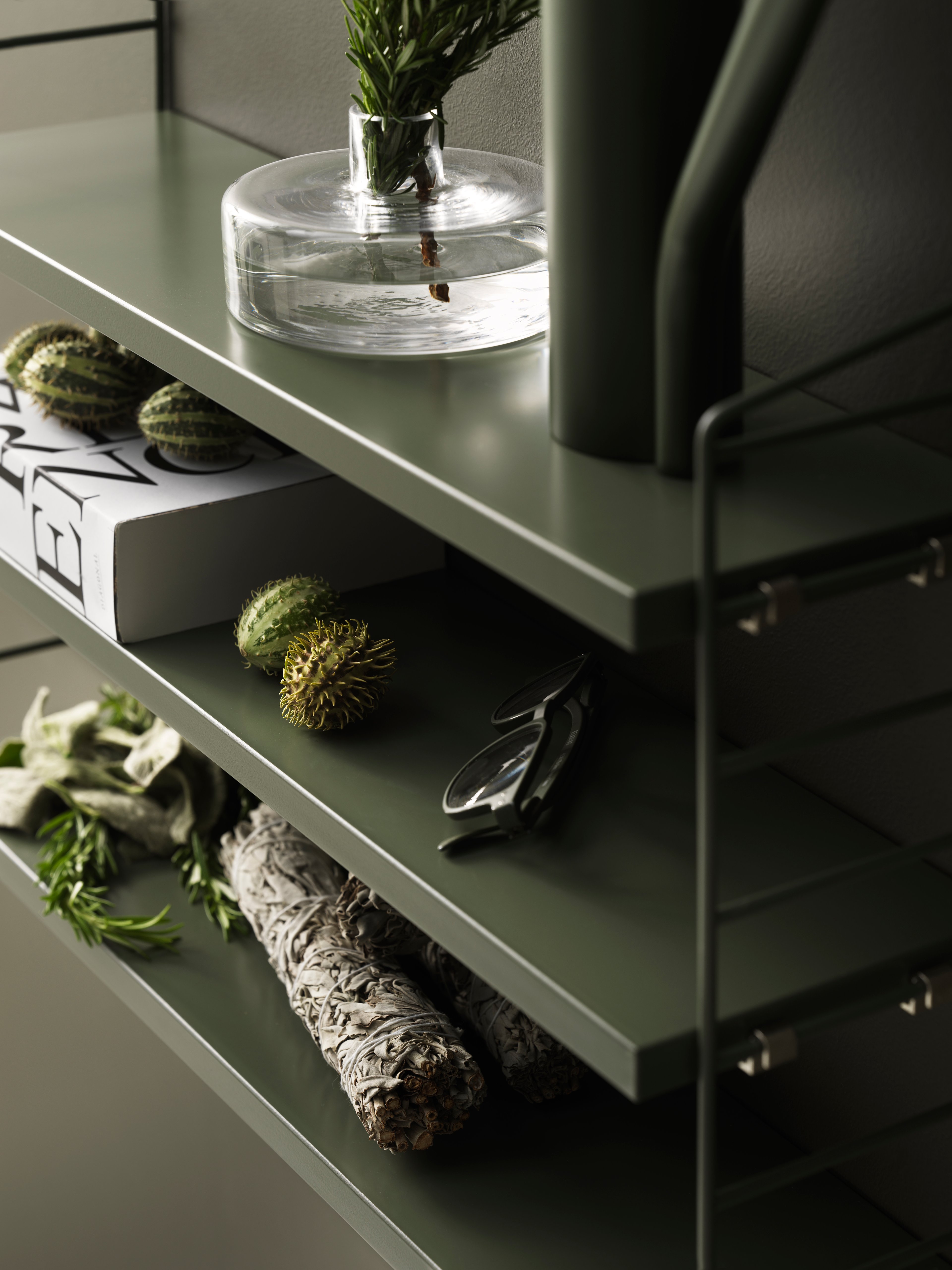 String® Pocket is sold as a complete shelf but is equally flexible as String® System. String® Pocket invites creativity and personality where you can combine two or three String® Pocket shelves into one larger shelf. Mix and match different colours and wooden alternatives to suit your style and preferences. Since the shelf is neat and practical it fits equally well as a nightstand as an extra shelf in your hallway. String® Pocket is sold as one complete unit containing two wire panels, height 50 cm, and three shelves, width 58 cm and depth 15 cm.