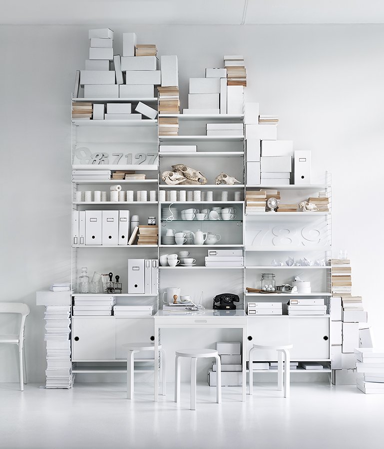 The cabinets with sliding doors are available in one width, 78 cm, along with two depths, 20 and 30 cm. The cabinets fit into all wire and plex panels from String® System. It is visually pleasing to add a bolder element to your shelf, like a cabinet, which also give you a lot of extra storage. The cabinet consists of one divider placed in the middle along with two adjustable inner shelves. The cabinet’s inner dimensions are 4 cm less than the outer dimensions. The cabinets are delivered unassembled.