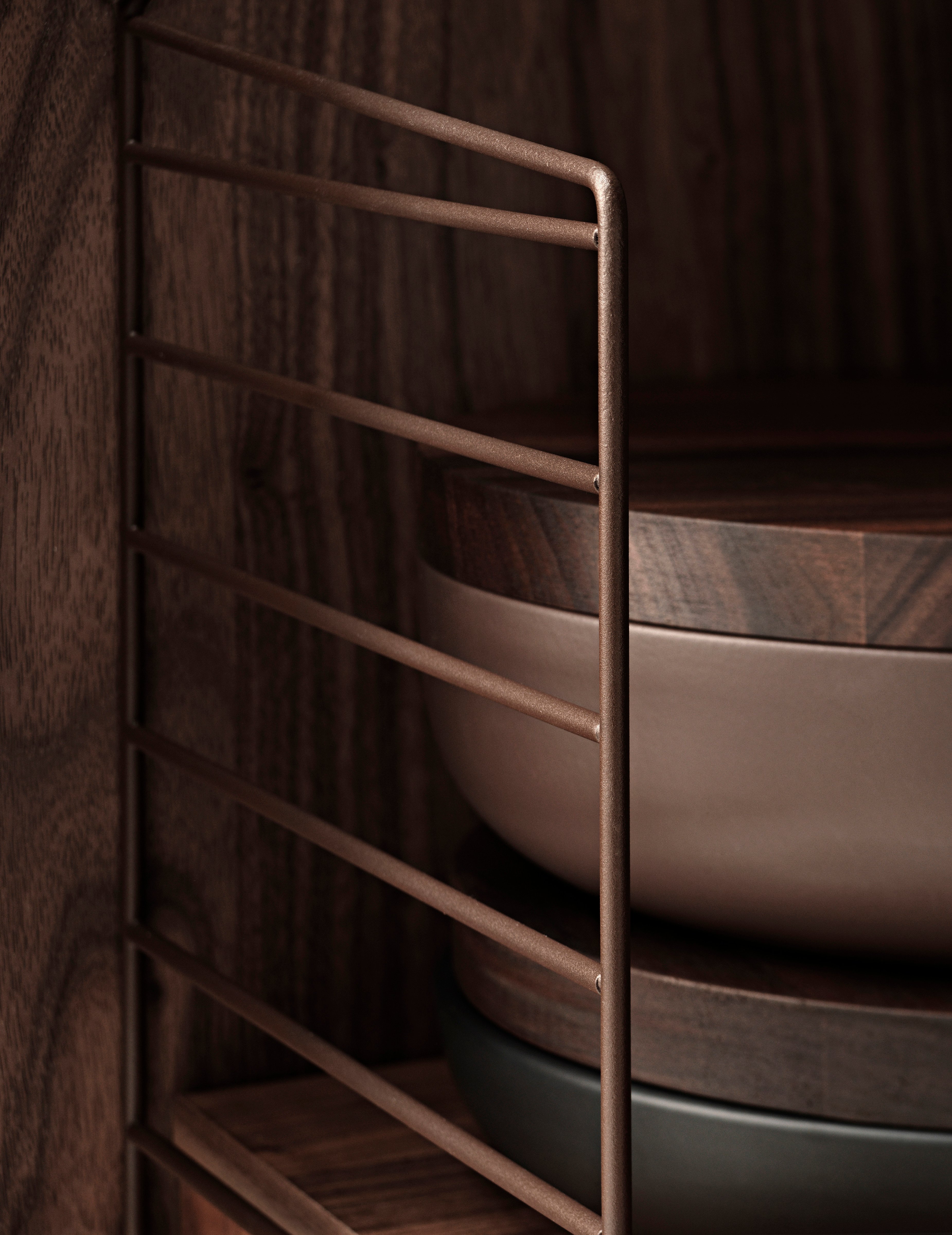 The wall panels are available in two heights, 50 and 75 cm, along with two depths, 20 and 30 cm. The panels are the base when building your string shelf. When the panels are decided you can start adding products from String® System. Choose among different shelves and cabinets. The wall panels are mounted onto a wall and do not touch either the floor or ceiling, which makes the whole shelf easy to adapt to any room. Make your shelf even more functional and unique by adding organizers or hooks, which all are placed on the panel’s threads. The panels come in two different packaging’s, either with one wall panel or two wall panels.