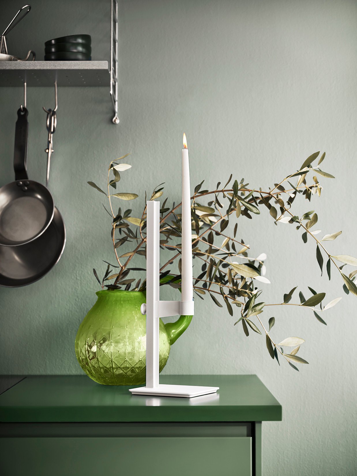 The Museum candle holder is an adjustable candle holder in aluminium. The candle holder has the following dimensions: w13 x d15 x h40 cm where the highest height for the candle is 35.5 cm, and the lowest height is 3.5 cm.