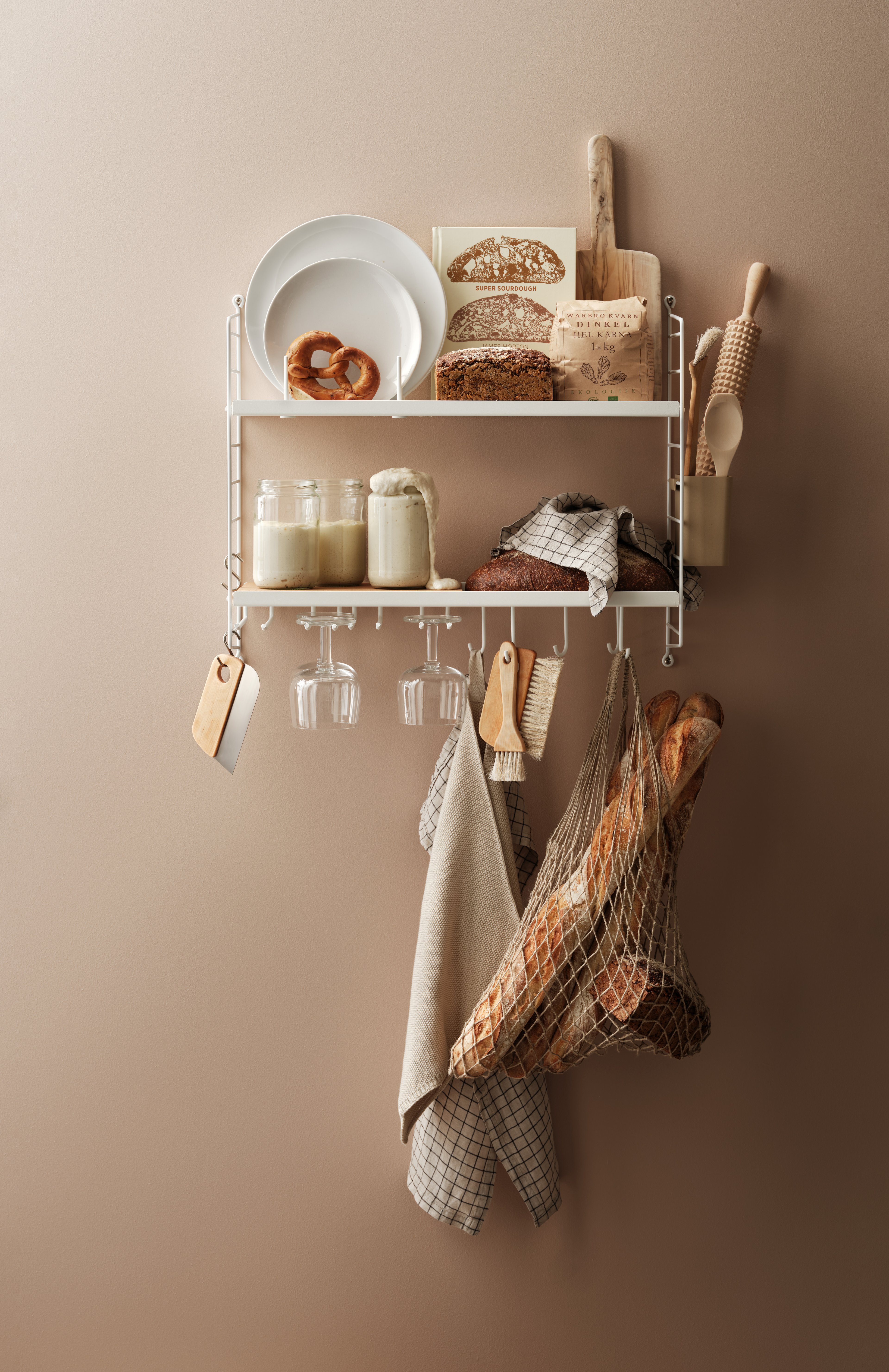 The plate racks are created to offer a complete kitchen solution. Position the plates either sideways or facing forward. They are available in two sizes with the following dimensions: w2.5 x d20 x h7.5 cm and w2.5 x d30 x h7.5 cm where you can fit 6 or 8 plates at the same time.