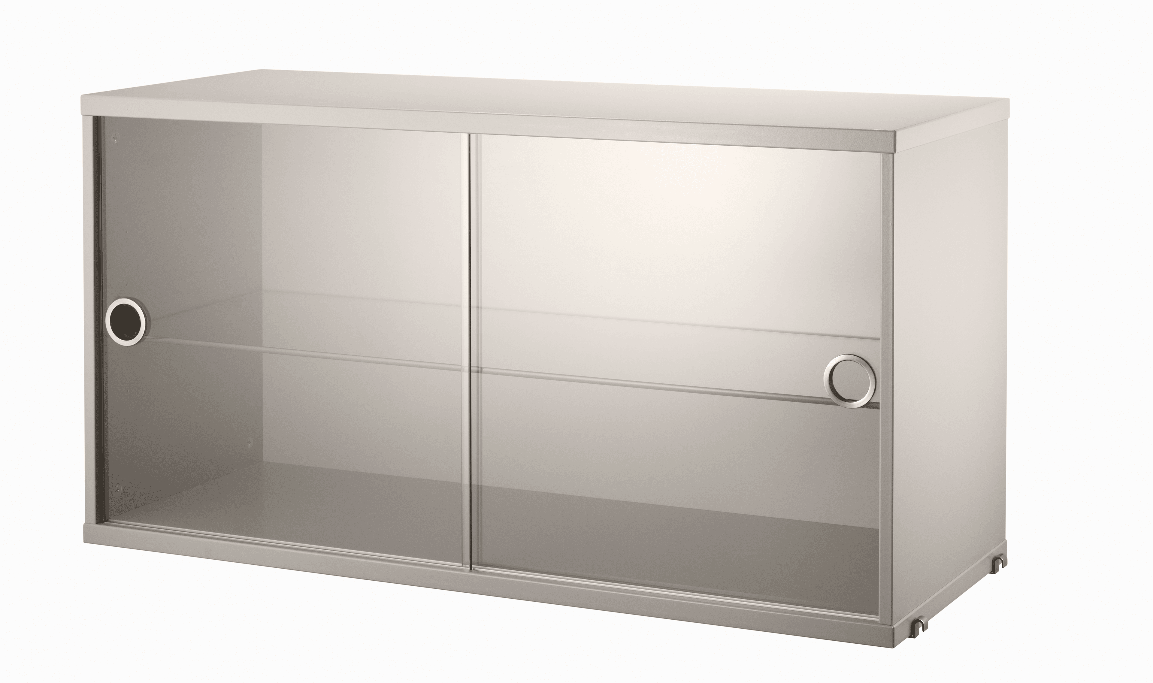 The display cabinet with sliding glass doors is available in one width, 78 cm, and one depth, 30 cm. The display cabinets fit into all wire panels from String® System if the depth of the panels is 30 cm. It is visually pleasing to add a bolder element to your shelf, like a cabinet, which also give you a lot of extra storage and the possibility to showcase something fragile. The display cabinet consists of one adjustable inner shelf in glass and the internal dimensions are: depth 26 cm, width 74 cm, and height 38 cm. The display cabinet is delivered unassembled.