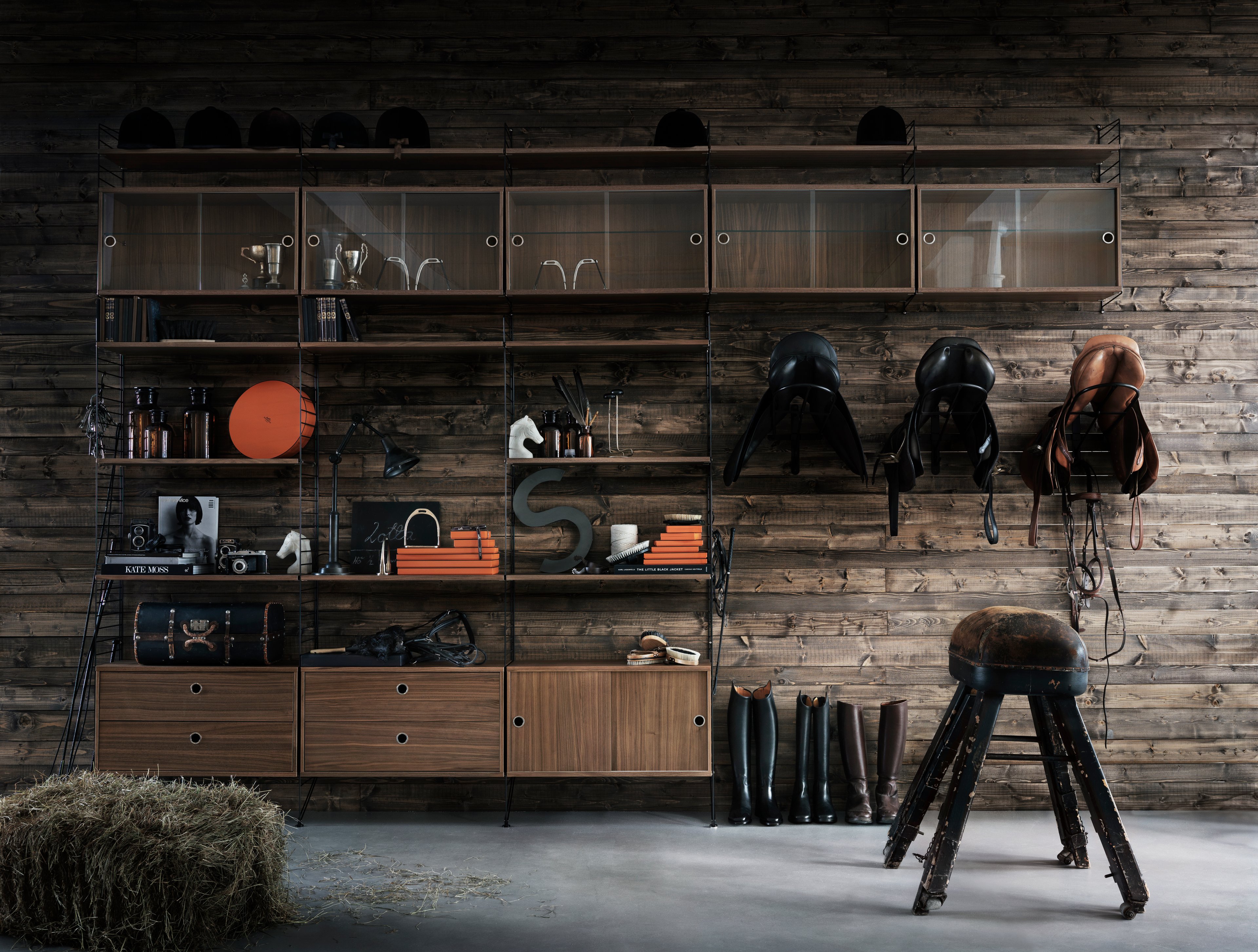 The display cabinet with sliding glass doors is available in one width, 78 cm, and one depth, 30 cm. The display cabinets fit into all wire panels from String® System if the depth of the panels is 30 cm. It is visually pleasing to add a bolder element to your shelf, like a cabinet, which also give you a lot of extra storage and the possibility to showcase something fragile. The display cabinet consists of one adjustable inner shelf in glass and the internal dimensions are: depth 26 cm, width 74 cm, and height 38 cm. The display cabinet is delivered unassembled.