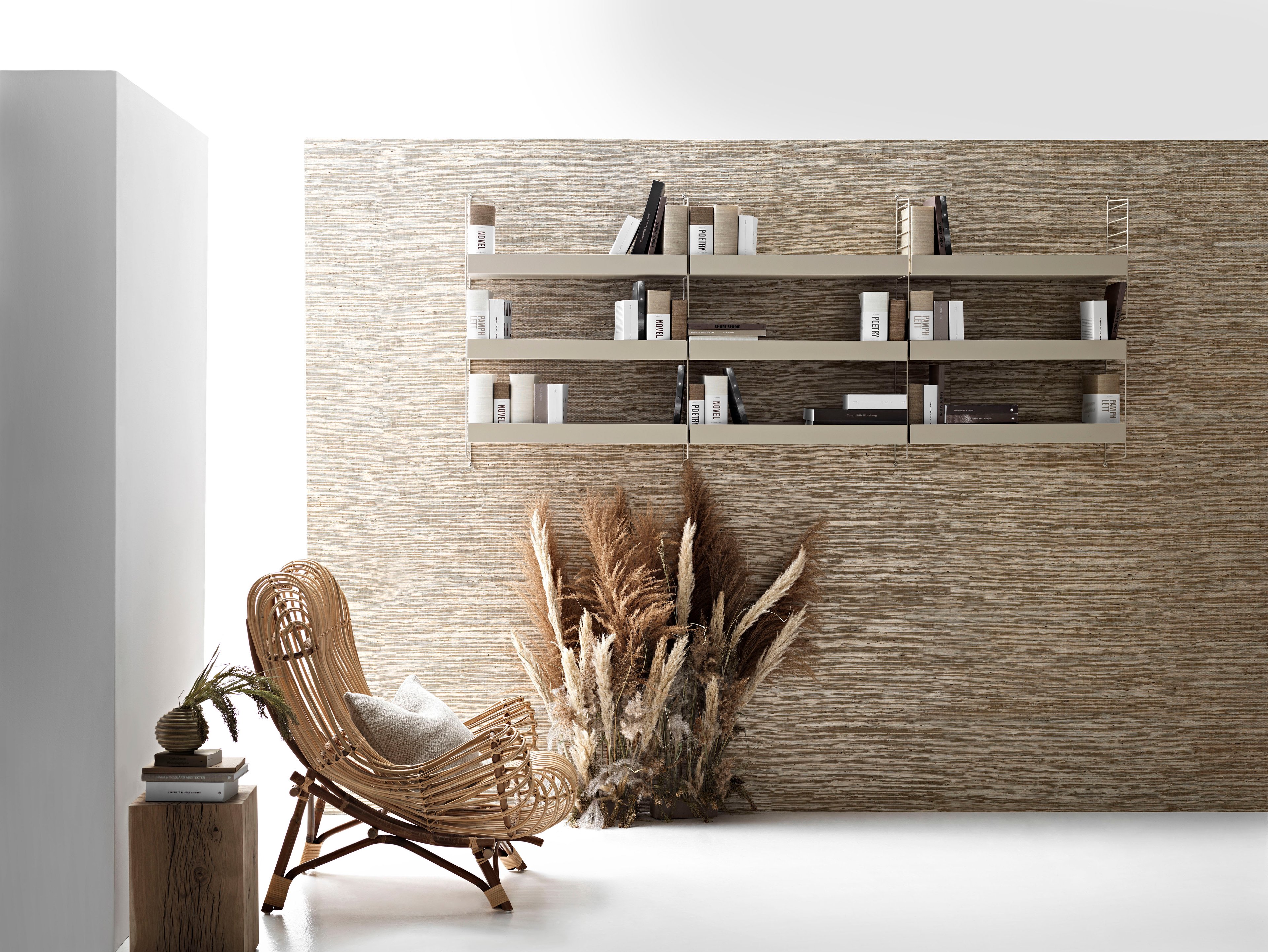 Wall-hung combination with a mix of metal shelves with high and low edge. Aesthetically pleasing to look at with convenient high edges to hide things like the TV remote control.