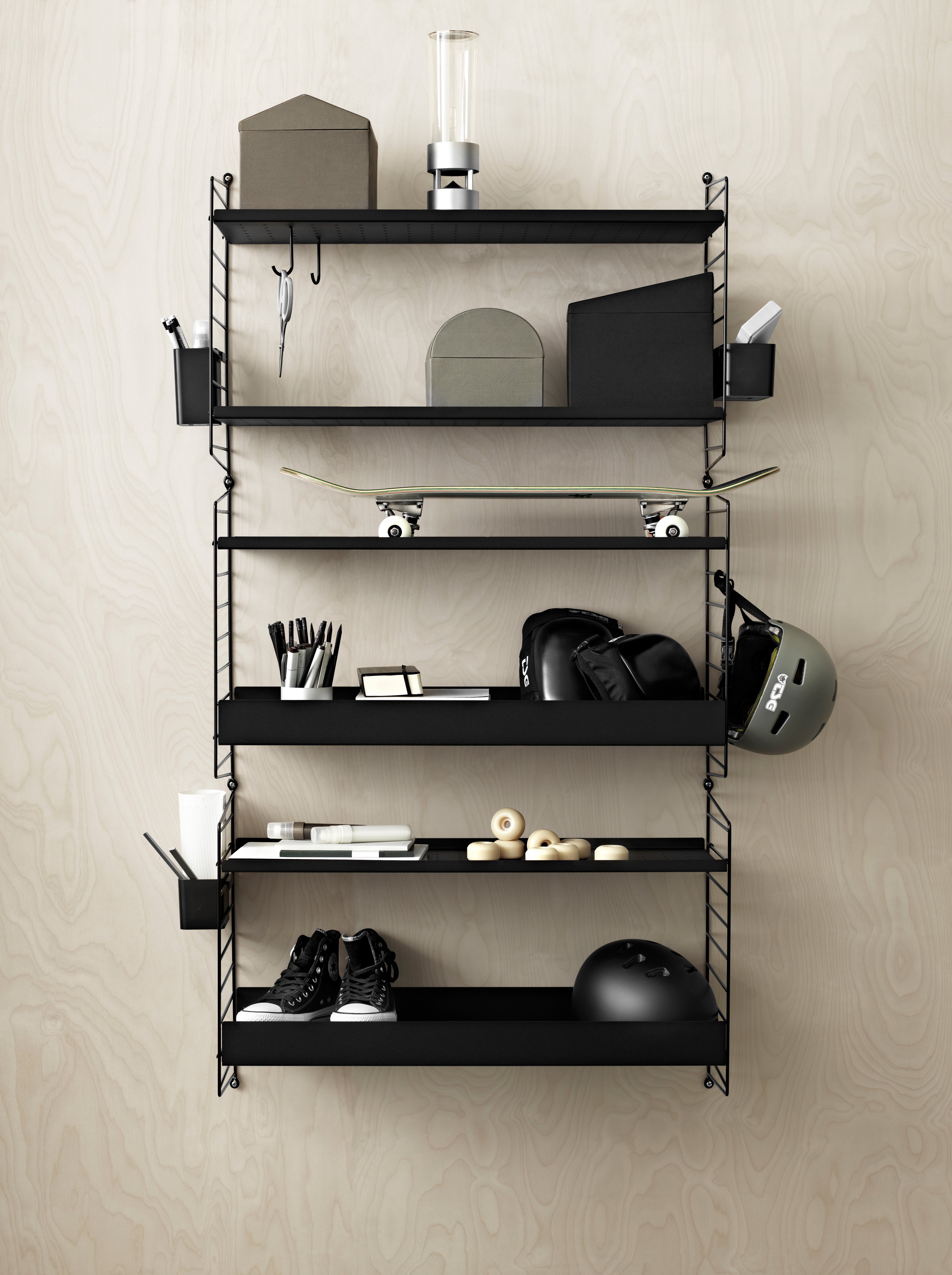 The metal shelves with low edge are available in two widths, 58 and 78 cm, along with two depths, 20 and 30 cm. The shelves are easy to move around and fit into wire and plex panels from String® System if the shelves and panels have the same depth. The 2 cm high edge makes the shelves blend right into a shelving combination with wooden shelves. The perforated shelves are the optimal base to be creative with our accessories. Add hooks, rods, or hanger racks to design your own unique shelf. Each packaging contains one metal shelf.