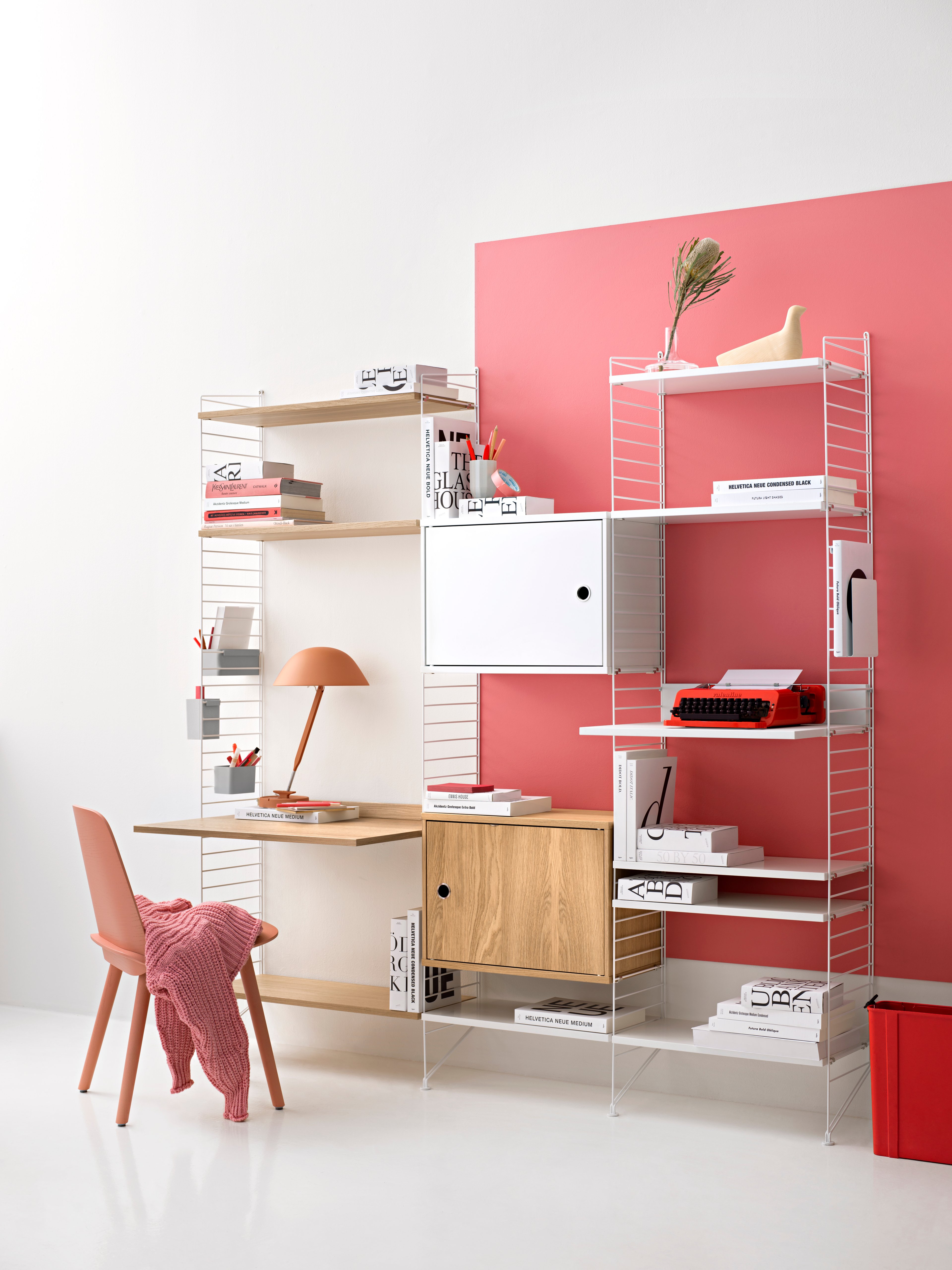 The work desk is available in one size, 78x58 cm and fits into wire panels from String® System with depth 30 cm. The work desk can easily be adjusted to your preferred height and can be used in an office, kitchen, hallway, or any other room where you might have the need for an additional table. Make your workspace complete by mounting a works drawer underneath the work desk where you can store pens, notebooks, and such. Each packaging contains one work desk, one ledge to place against the wall to stabilize the work desk along with brackets. Choose among different colours and wood types.