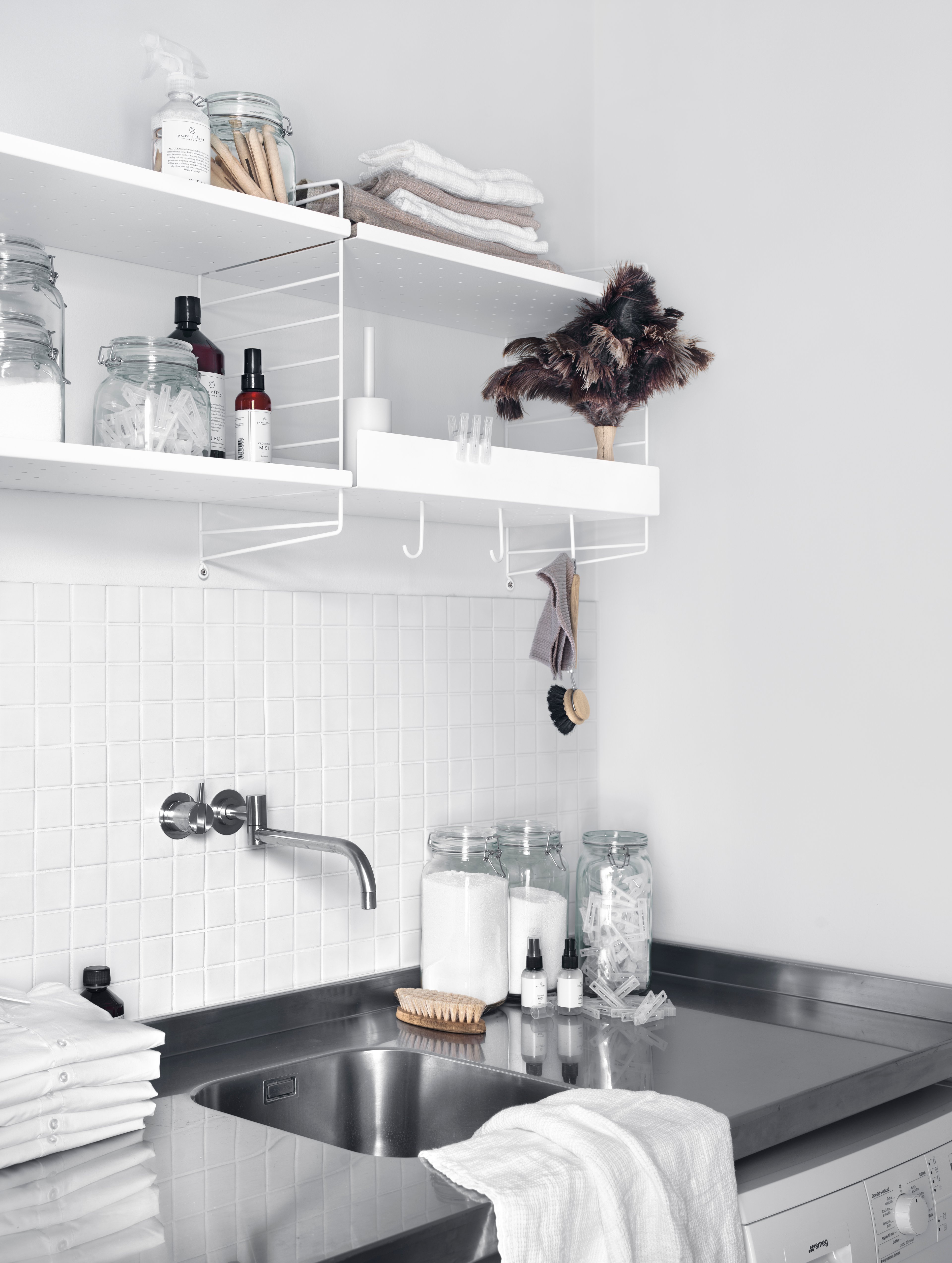 The metal shelves with high edge are available in two widths, 58 and 78 cm, along with two depths, 20 and 30 cm. The shelves are easy to move around and fit into wire and plex panels from String® System if the shelves and panels have the same depth. The 7 cm high edge creates character and valuable storage space. The perforated shelves are the optimal base to be creative with our accessories. Add hooks, rods, or hanger racks to design your own unique shelf. Each packaging contains one metal shelf.