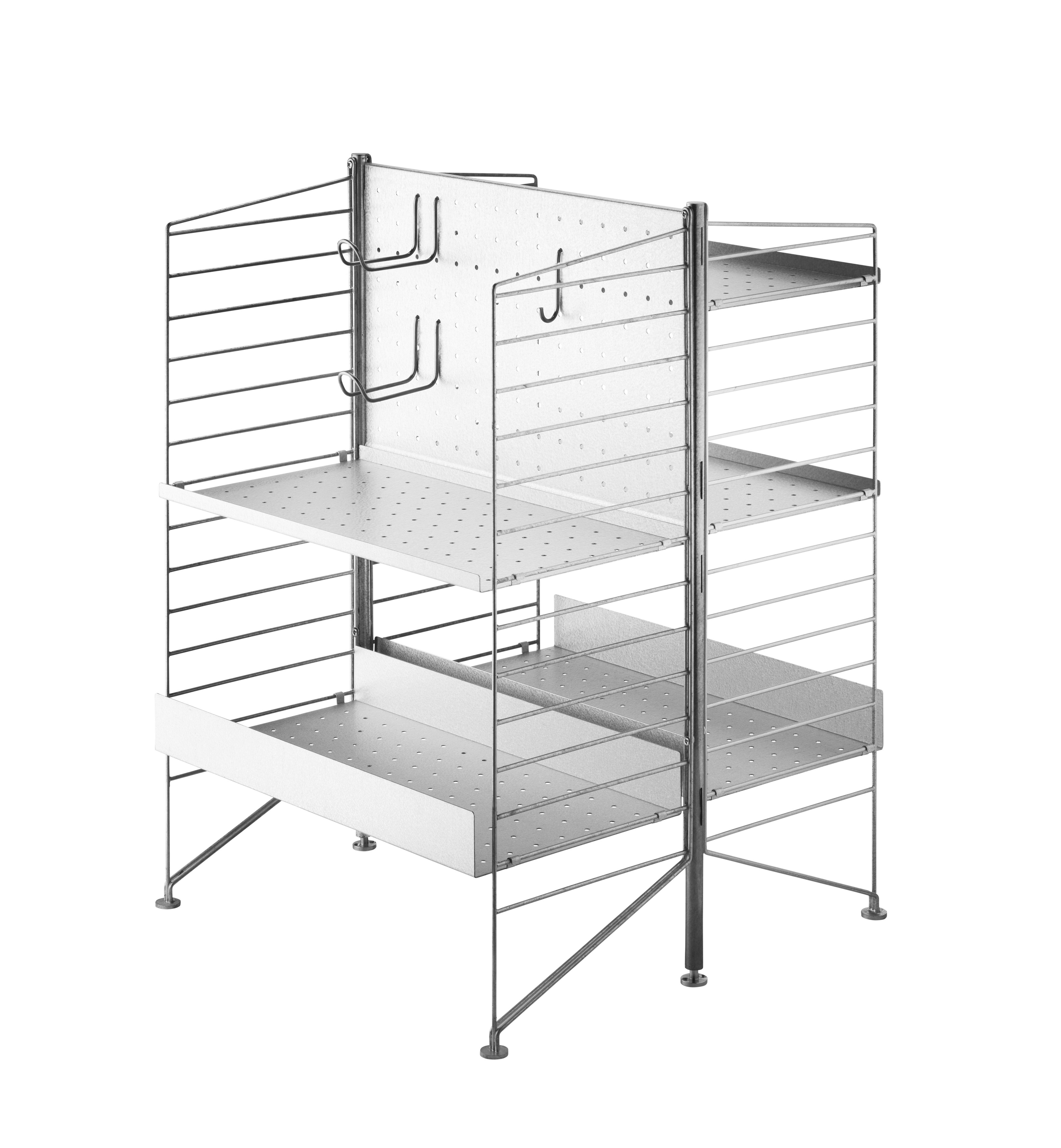 The free standing shelf intended for outdoor use from String® System fits equally well on a smaller balcony as on a larger terrace. The shelf is completely free standing but, if desired, can be secured to the base it is standing on. A complete section of the free standing shelf consists of one back panel, two uprights and two galvanized floor panels with height 85 cm and depth 30 cm. To build additional sections, you need one upright along with one panel for each section. We recommend at least one back panel, preferably placed in the middle, for a free standing shelf consisting of three sections. Add hooks to increase the storage possibilities. One section has the dimensions: width 61 cm and height 87 cm.