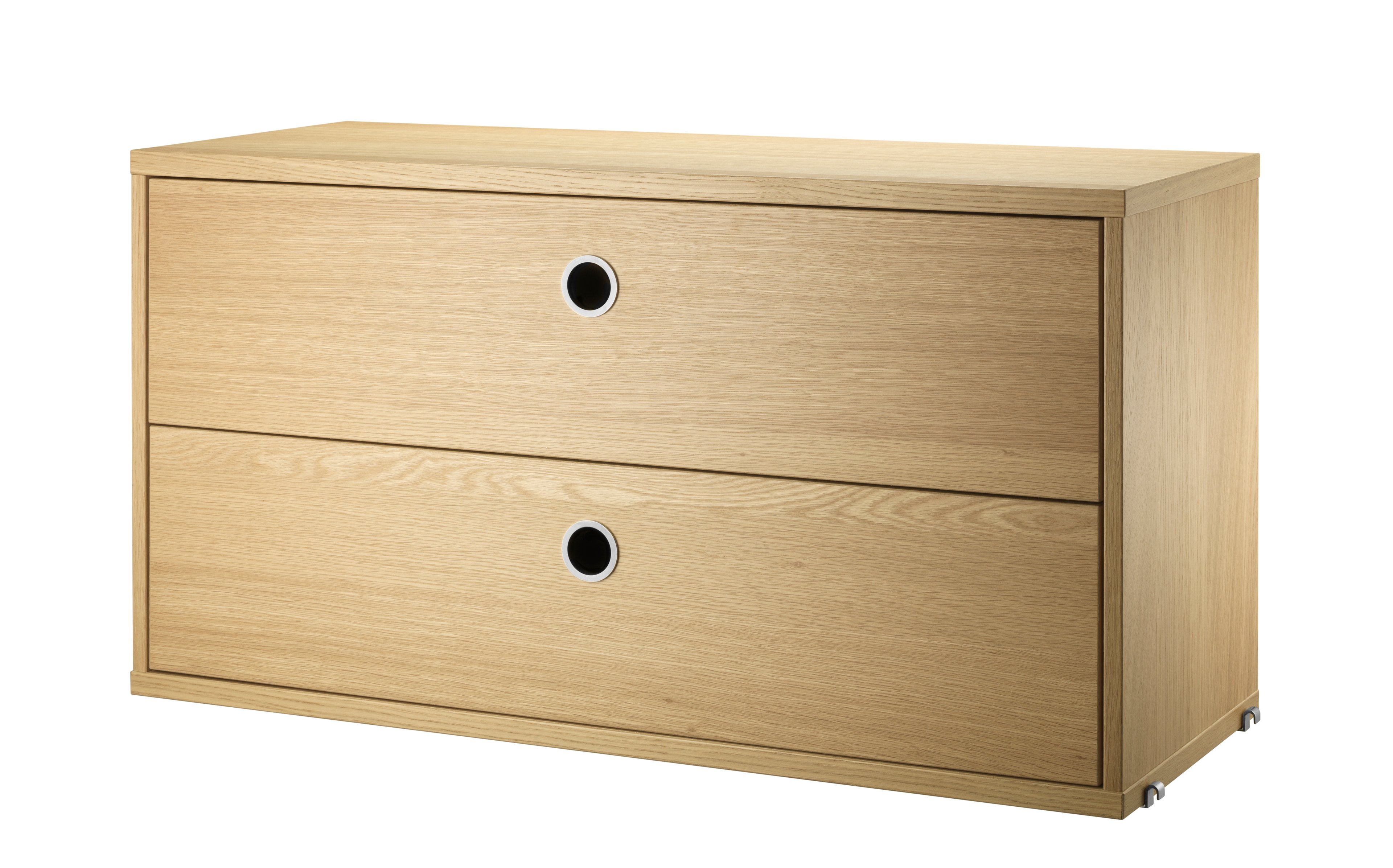 The chests of drawers are available in two widths, 78 and 58 cm, and one depth, 30 cm. The chests of drawers fit into all 30 cm deep wire and plex panels from String® System. They are designed with two drawers to offer hidden storage in your shelving combination. The chests of drawers are a great fit in either the hallway, living room or kids’ room where the need for hidden storage often is big. Chest of drawer w58 x d30 x h42 cm has internal dimensions (for each drawer) depth 23.7 cm, width 51.3 cm and height 16 cm. Chest of drawer w78 x d30 x h42 cm has internal dimensions (for each drawer) depth 23.7 cm, width 71.3 cm and height 16 cm. The chests of drawers are delivered unassembled.